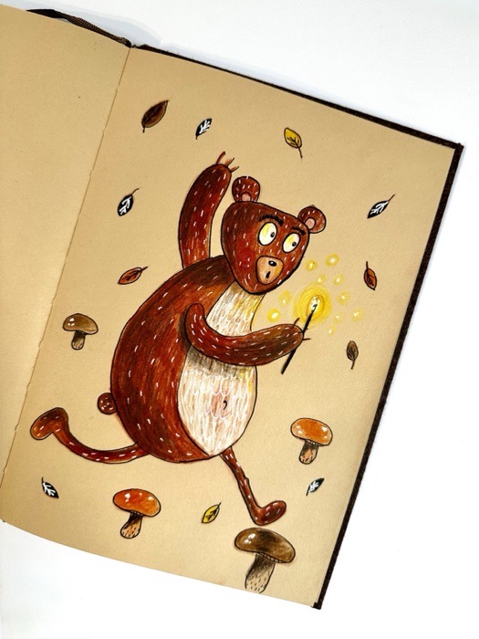Sketchbook page: a bear running with a magic wand.