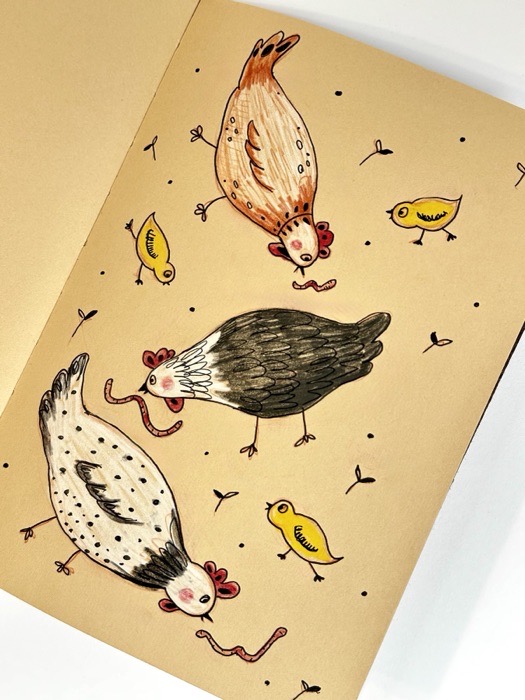 Sketchbook page: a speckled hen, a rooster and a scatter of chicks.