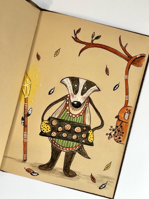 Sketchbook page: a badger with cookies